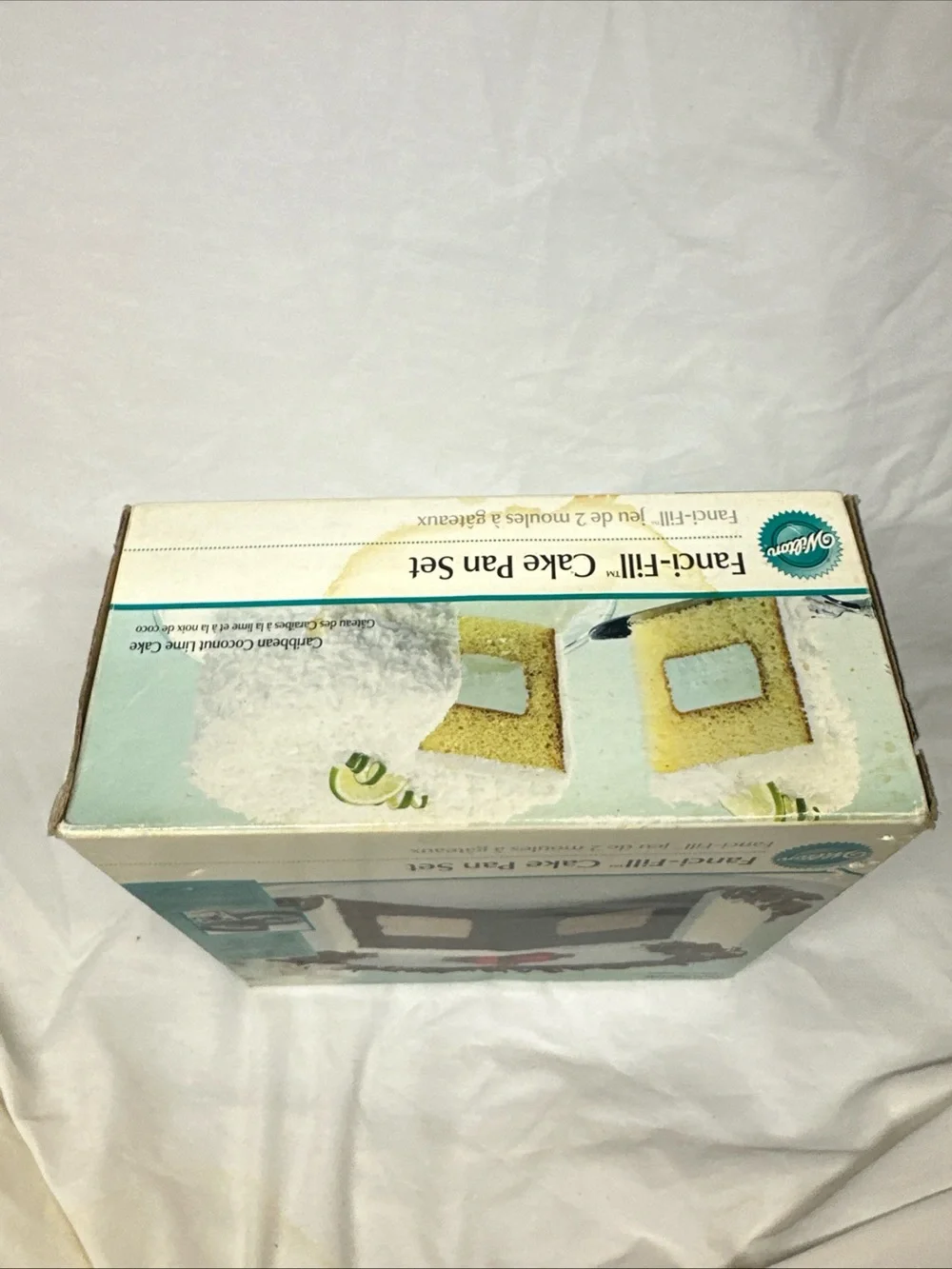 Wilton Fanci-Fill Cake Pan Set - White and Teal Packaging